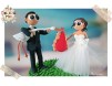 Figurine de tort pentru nunta - Mirele a prins barza cu sacul plin cu bebelusi