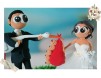 Figurine de tort pentru nunta - Mirele a prins barza cu sacul plin cu bebelusi