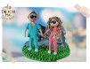 Figurine de tort pentru nunta - Miri doctori alaturi de motocicleta lor