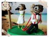 Figurine de tort pentru nunta - Mireasa pasionata de fotografie si Mirele pasionat de clubul Mojo si Vama Veche